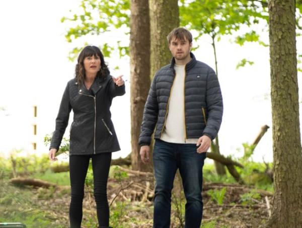 Chas and Tom search for Belle in the woods in Emmerdale