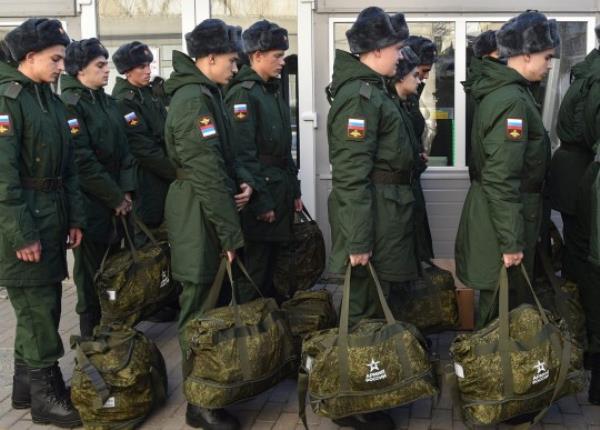 epa10296356 Russian cons<em></em>cripts pictured at a railway station in Sevastopol before leaving to serve in the war, Crimea, 09 November 2022. In 2022, as part of the autumn cons<em></em>cription, the number of those called up for military service will be 120 thousand people. Male citizens of the Russian Federation aged 18 to 27 who have not previously completed military service fall under the autumn draft. Cons<em></em>cripts of the autumn cons<em></em>cription will not be sent to serve in the DPR, LPR, Zaporizhzhia and Kherson regions. EPA/STRINGER
