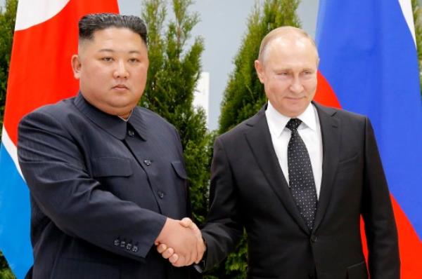 FILE - Russian President Vladimir Putin, right, and North Korea's leader Kim Jong Un shake hands during their meeting in Vladivostok, Russia, Thursday, April 25, 2019. A North Korean train presumably carrying North Korean leader Jong Un has departed for Russia for a possible meeting with Russian President Putin, South Korean media said Monday, Sept. 11, 2023. Citing unidentified South Korean government sources, the Chosun Ilbo newspaper reported that the train likely left the North Korean capital of Pyo<em></em>ngyang on Sunday evening and that a Kim-Putin meeting is possible as early as Tuesday. (AP Photo/Alexander Zemlianichenko, Pool, File)